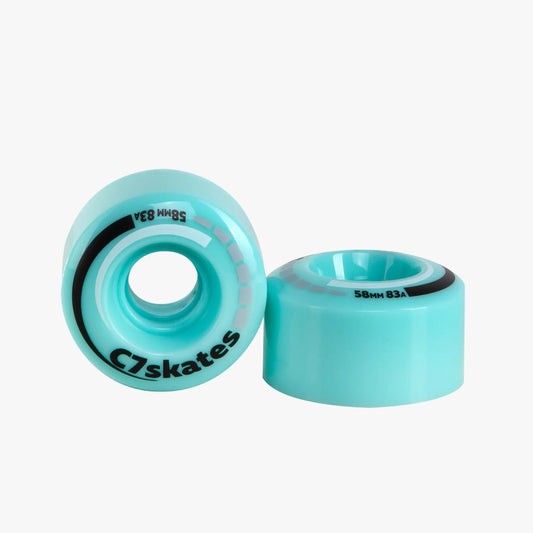 Two turquoise skates wheels with black text on a white background