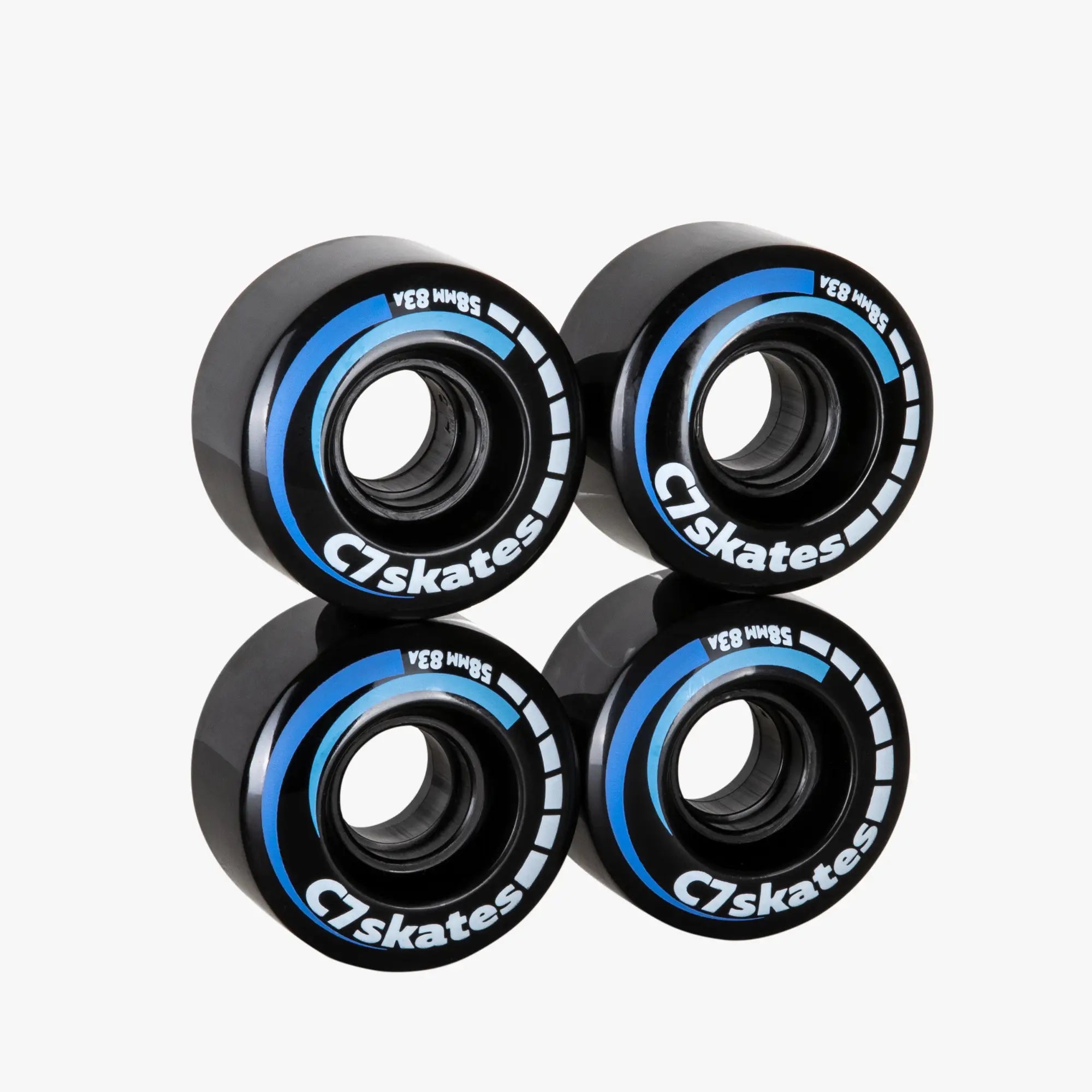 Four black and blue C7skates wheels on a white background