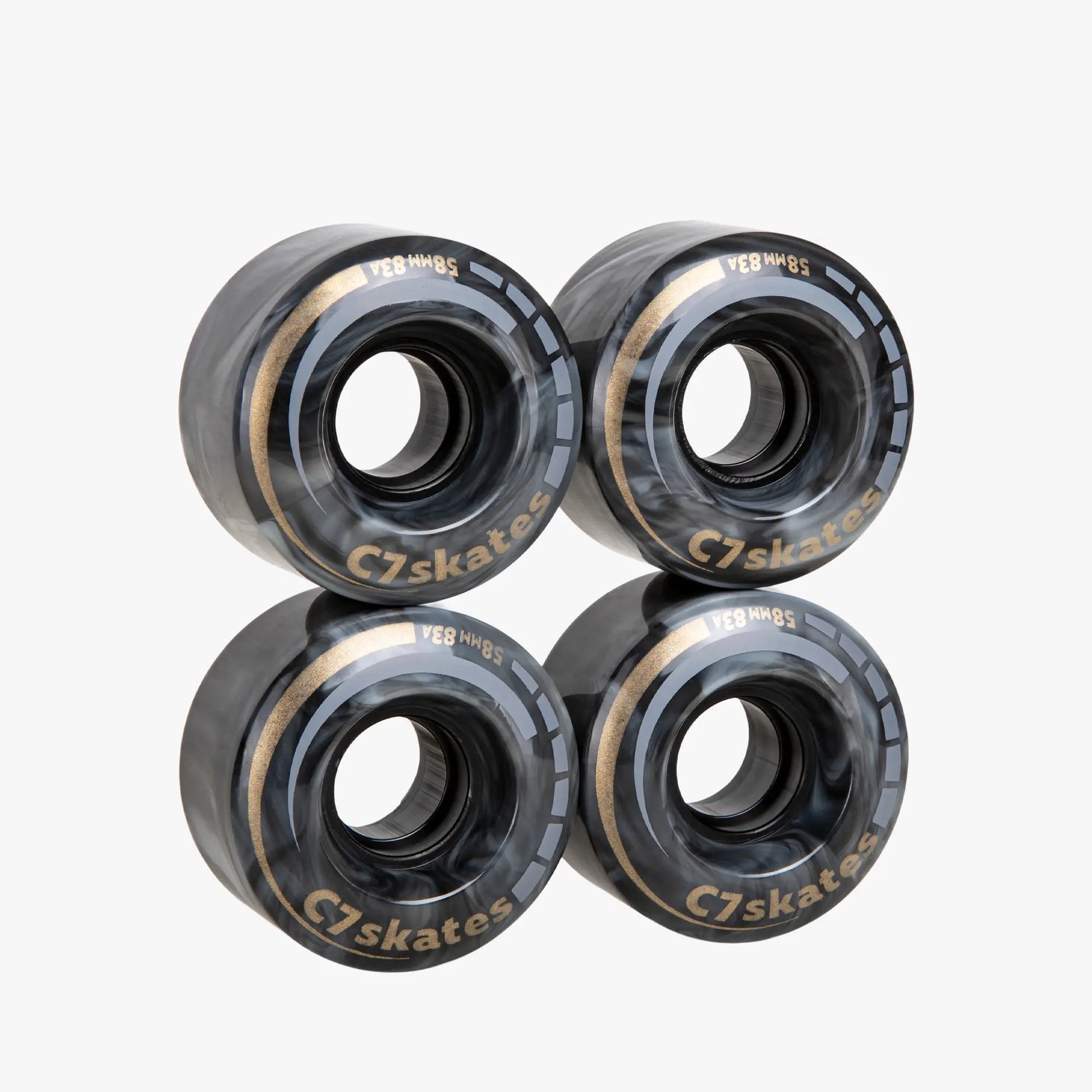 Four C7 skates wheels on a white background