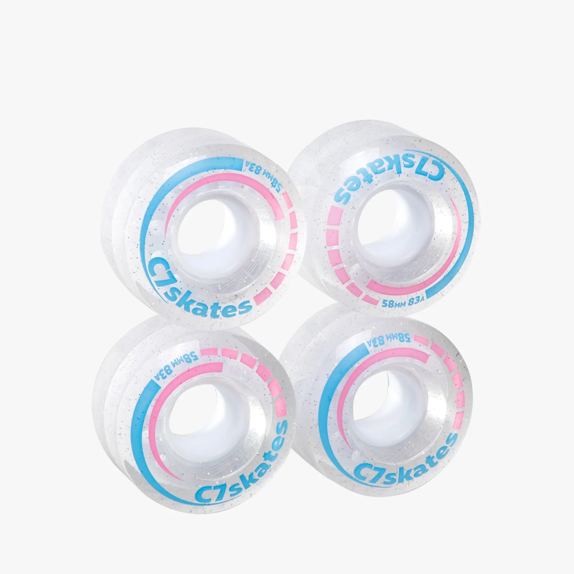 Four C7skates wheels with white centers and colorful rims on a white background