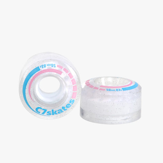 Two clear wheels with pink and blue accents on a white background
